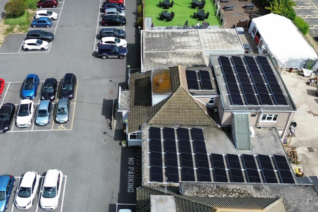 Drone photo of Canvey Island Conservative Club solar panel installation on flat roof