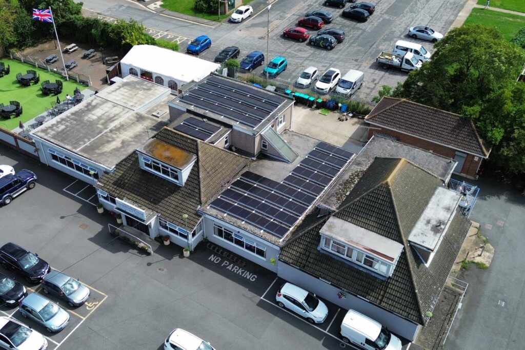 Drone photo of Canvey Island Conservative Club solar panel installation on flat roof