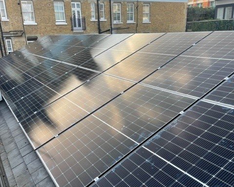 Solar panels installed on roof of London based office building