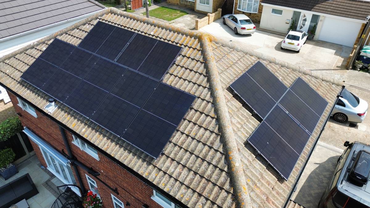 Drone photo of solar panel installation on a detached home