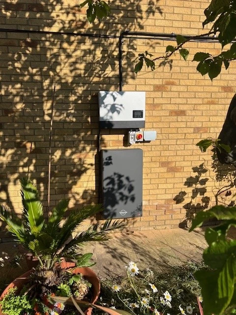 Wall mounted solar panel battery system