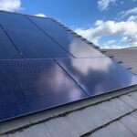 Solar panels installed on a slate roof