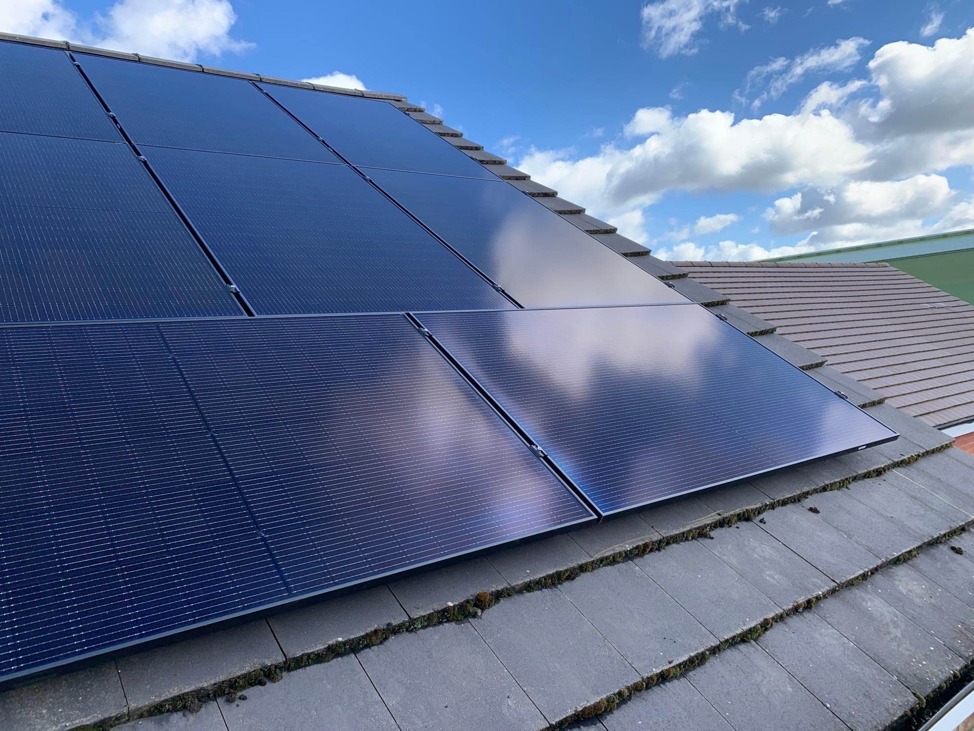 Solar panels installed on a slate roof