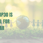 Image showing the world with green figurines holding hands