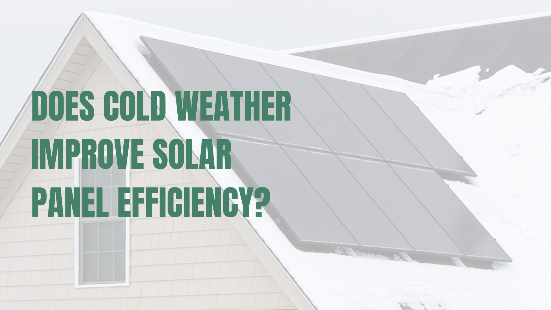 Solar panels installed on a pitched roof that is covered in snow