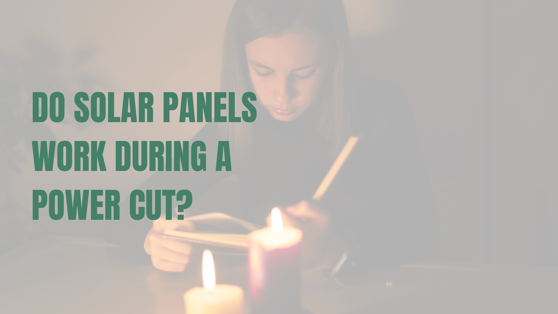Stock image of a young girl reading by candlelight