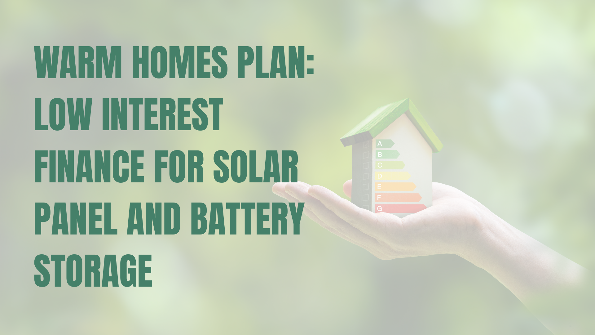 Stock image of a hand holding a energy efficient rating house